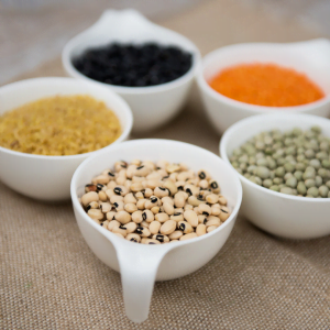 5 cups of assorted lentils arranged in a circle